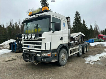 Kamion sa hidrauličnom kukom Scania R144 460 Tridem Hook truck with truck bed