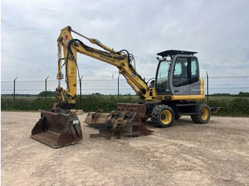 Bager točkaš NEW HOLLAND
