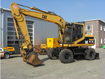 Bager točkaš CAT 312: slika 1