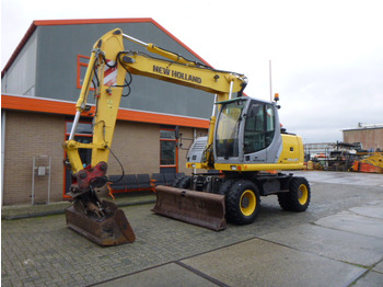 Bager točkaš NEW HOLLAND