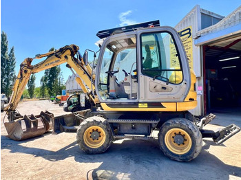 Bager točkaš New Holland MH 2.6 PELLE A PNEUS 10T: slika 2