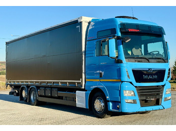 Kamion sa ceradom MAN TGX