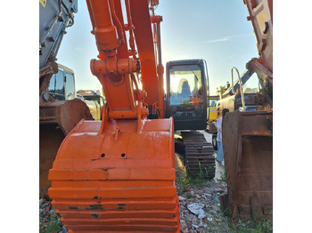 Bager HITACHI ZX210
