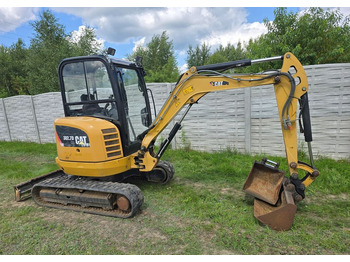 Mini bager CATERPILLAR