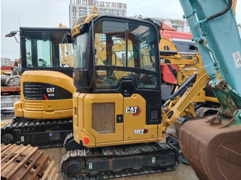 Mini bager CATERPILLAR 302