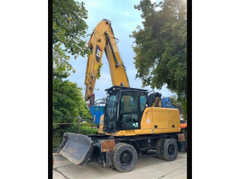 Bager za obradu otpada/ Industrije CATERPILLAR MH3022