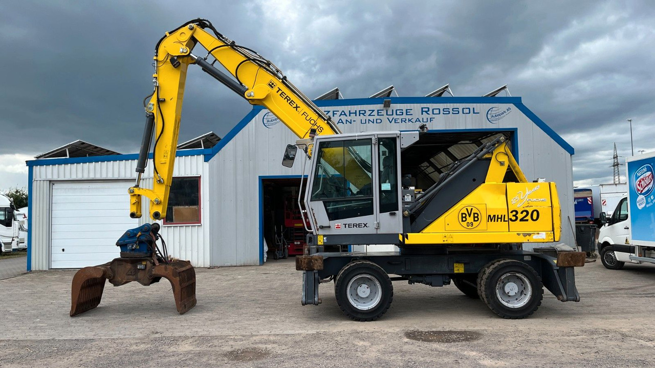 Fuchs TeRex MHL 320 D Umschlagbagger Greifer Pratzen - Bager za obradu otpada/ Industrije: slika 1 Fuchs TeRex MHL 320 D Umschlagbagger Greifer Pratzen - Bager za obradu otpada/ Industrije: slika 1