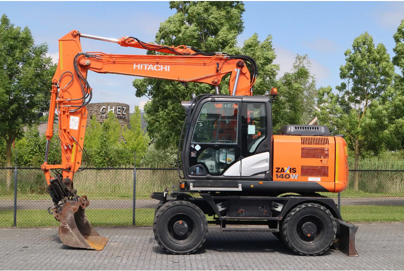 Hitachi ZX 140 W-5B | TILT QC | BUCKET | DOZER BLADE | DUTCH REG. - Bager točkaš: slika 1 Hitachi ZX 140 W-5B | TILT QC | BUCKET | DOZER BLADE | DUTCH REG. - Bager točkaš: slika 1