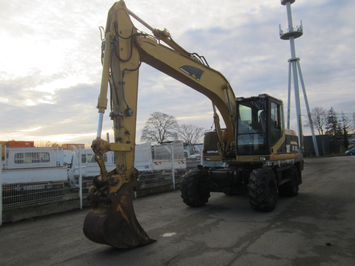 Caterpillar M315 - Bager točkaš: slika 2 Caterpillar M315 - Bager točkaš: slika 2