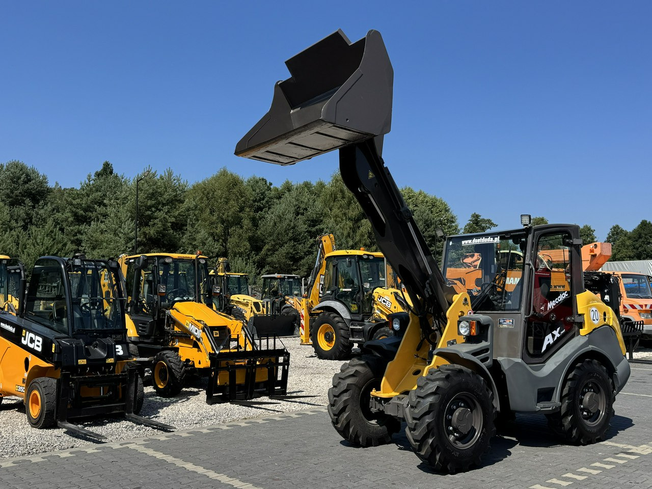 Mecalac AX 700 Szybko-Złącze Łyżka Super Stan - Utovarivač točkaš: slika 1 Mecalac AX 700 Szybko-Złącze Łyżka Super Stan - Utovarivač točkaš: slika 1