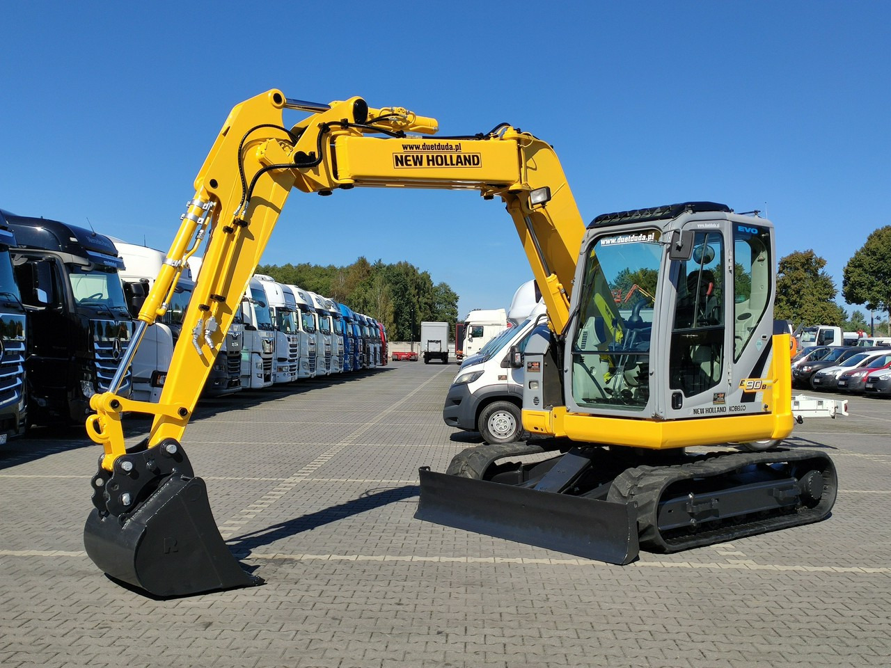 New Holland E90B SR -2 Gąsienicowa 10ton - Mini bager: slika 1 New Holland E90B SR -2 Gąsienicowa 10ton - Mini bager: slika 1