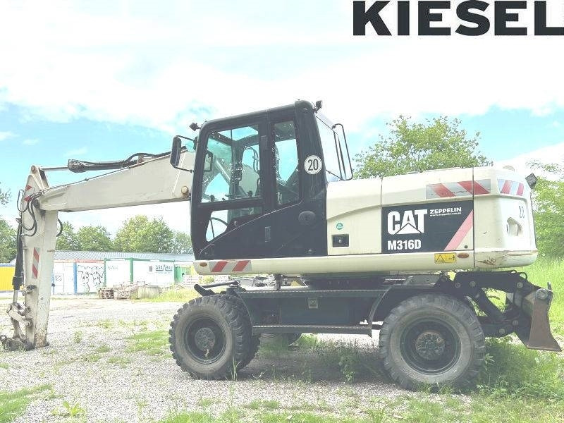 CAT M 316 D - Bager točkaš: slika 1 CAT M 316 D - Bager točkaš: slika 1