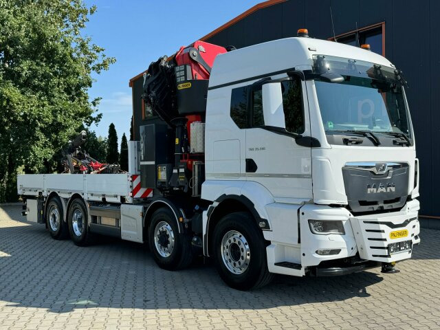 MAN 35.510 8x4H-6 BL Pritsche mit Kran Palfinger - Kamion sa tovarnim sandukom, Kamion sa dizalicom: slika 1 MAN 35.510 8x4H-6 BL Pritsche mit Kran Palfinger - Kamion sa tovarnim sandukom, Kamion sa dizalicom: slika 1