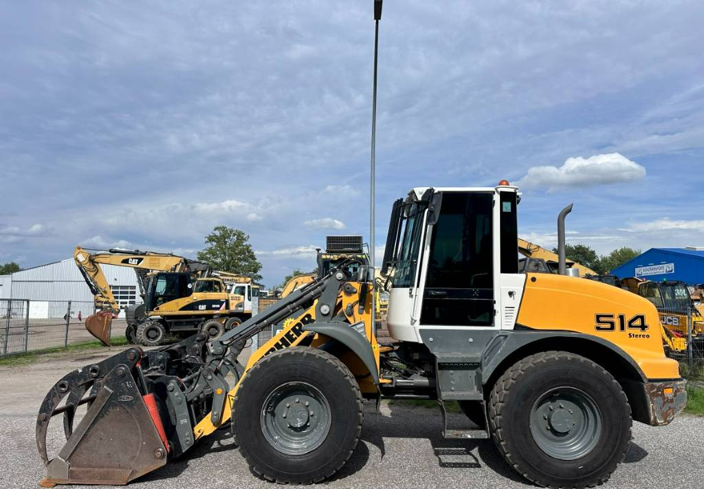 Liebherr L 514 Stereo +30 Kmh Klima 3er Kreis Greifschaufel - Utovarivač točkaš: slika 1 Liebherr L 514 Stereo +30 Kmh Klima 3er Kreis Greifschaufel - Utovarivač točkaš: slika 1