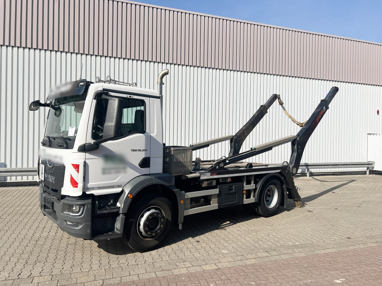 MAN TGM 18.320 4x2 BL TGM 18.320 4x2 BL, Hiab Tele-Absetzanlage, Funk - Kamion za utovaranje kontejnera: slika 1 MAN TGM 18.320 4x2 BL TGM 18.320 4x2 BL, Hiab Tele-Absetzanlage, Funk - Kamion za utovaranje kontejnera: slika 1
