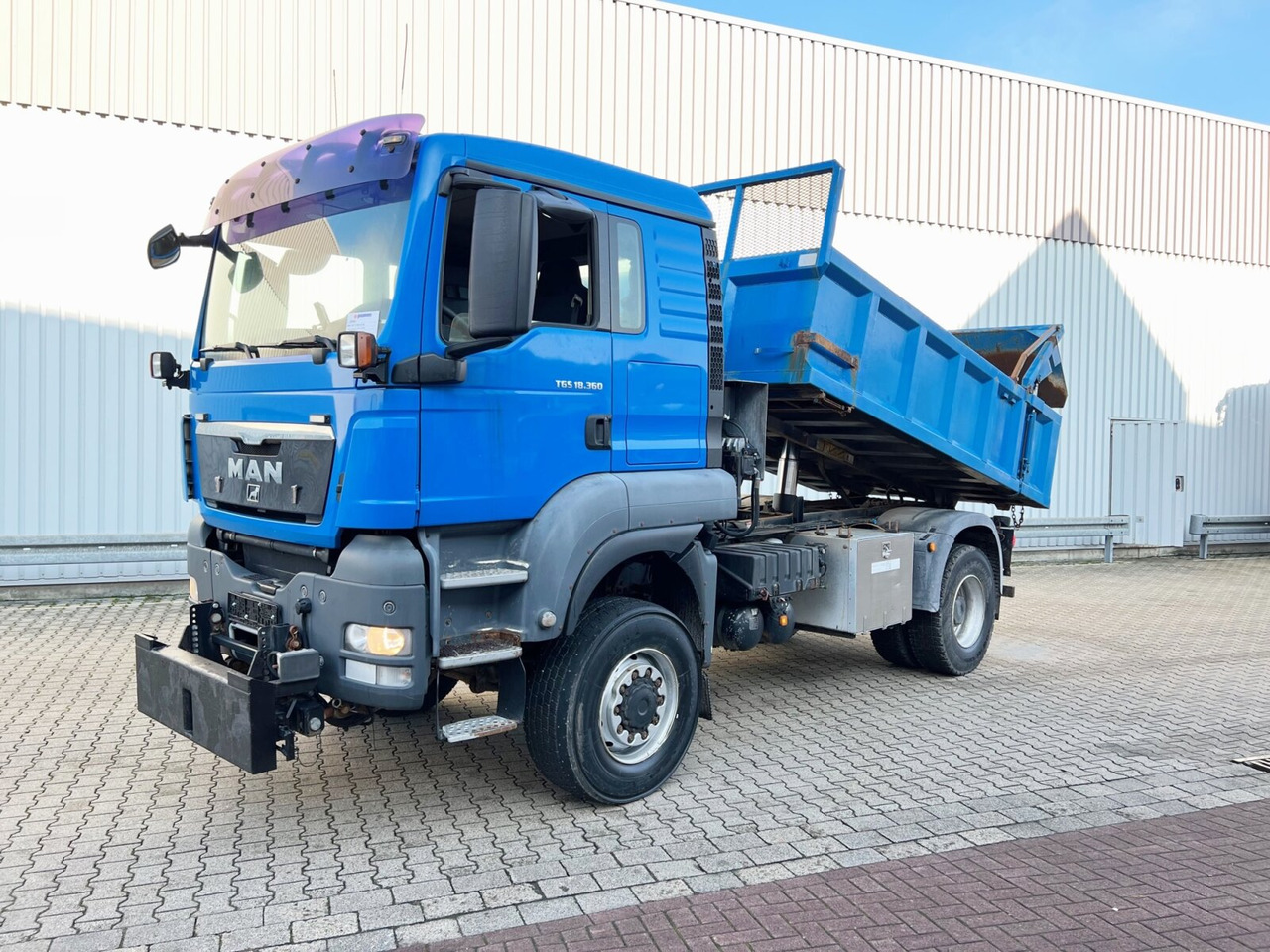MAN TGS 18.360 4X4 BL TGS 18.360 4X4 BL, Hinterkipper, hydr. Heckklappe, Winterdienstausstattung - Istovarivač: slika 1 MAN TGS 18.360 4X4 BL TGS 18.360 4X4 BL, Hinterkipper, hydr. Heckklappe, Winterdienstausstattung - Istovarivač: slika 1