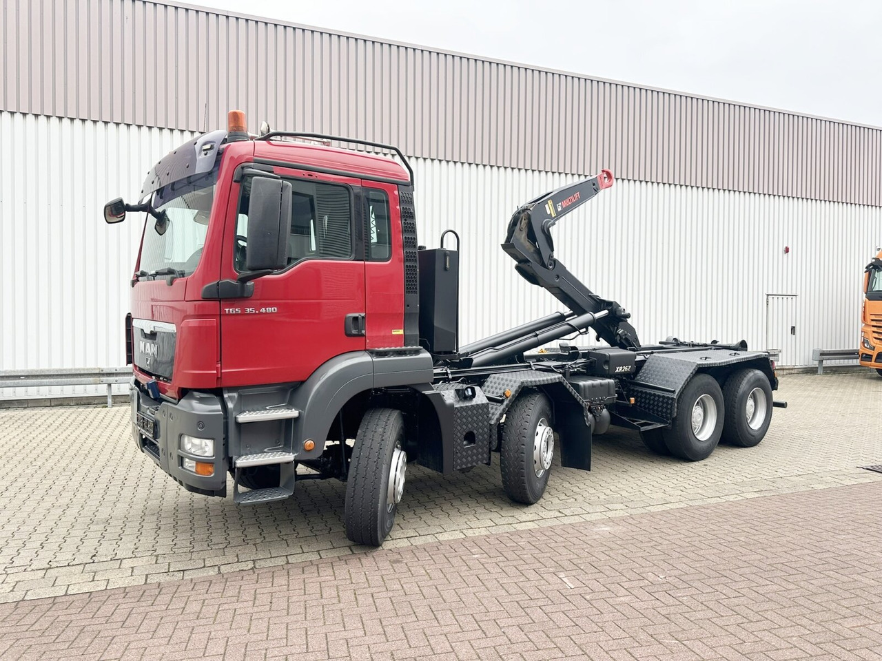 MAN TGS 35.480 8X4 BL TGS 35.400 8x4 BL, Schub-Knick bis 6,5m Container - Kamion sa hidrauličnom kukom: slika 1 MAN TGS 35.480 8X4 BL TGS 35.400 8x4 BL, Schub-Knick bis 6,5m Container - Kamion sa hidrauličnom kukom: slika 1