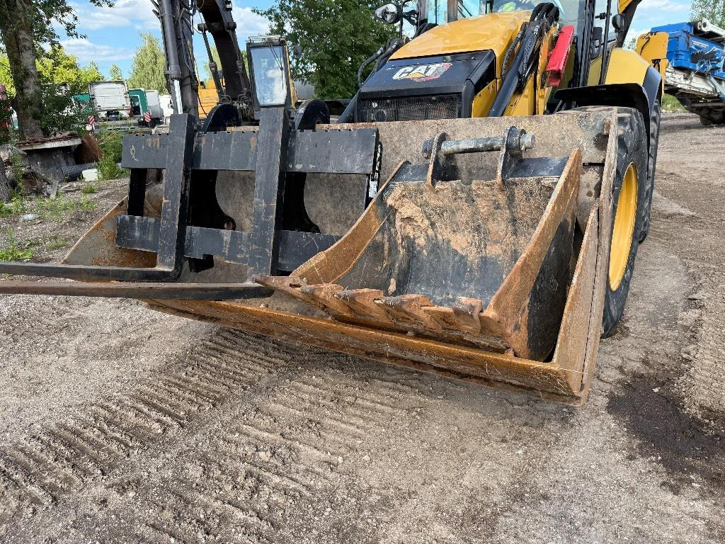 Bager utovarivač CAT 444: slika 8