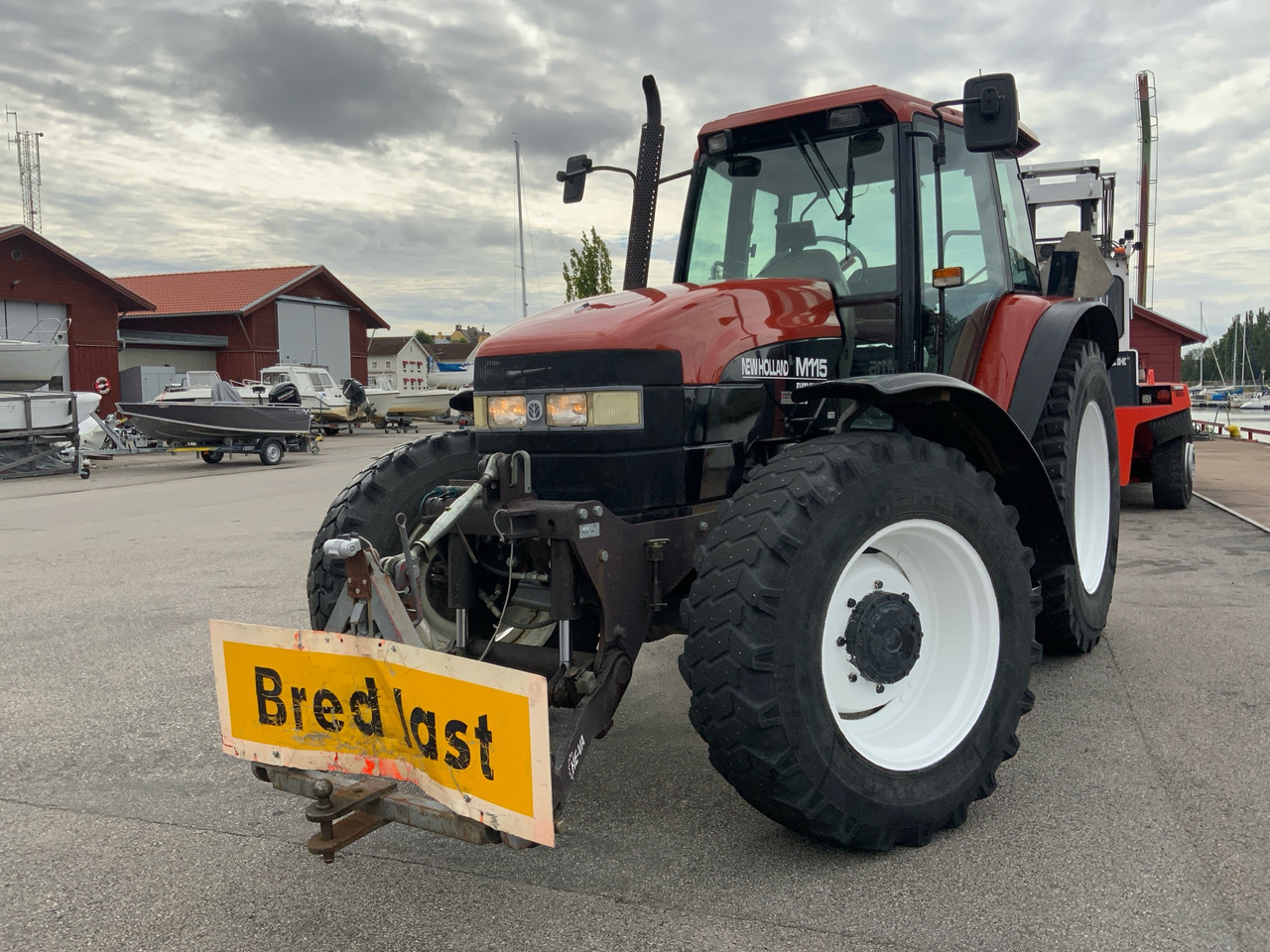 New Holland M115 - Traktor: slika 1 New Holland M115 - Traktor: slika 1