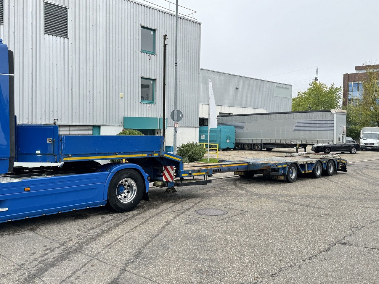 Doll S3L Tele-Tieflader+3,3m Radmulden Lift Lenkachse - Niska poluprikolica za prevoz: slika 1 Doll S3L Tele-Tieflader+3,3m Radmulden Lift Lenkachse - Niska poluprikolica za prevoz: slika 1