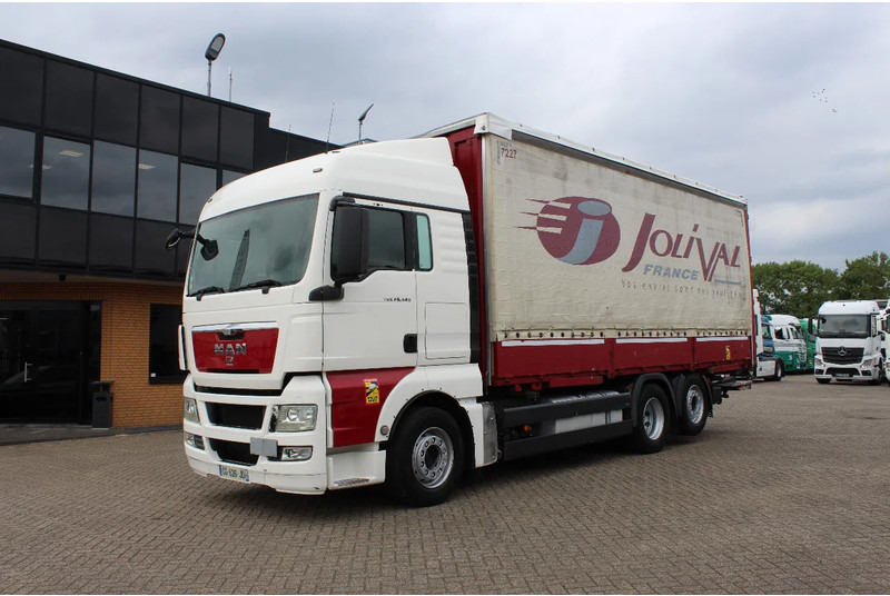 MAN TGX 26.440 * EURO5 * 6X2 * LIFT AXLE * - Kamion sa ceradom: slika 2 MAN TGX 26.440 * EURO5 * 6X2 * LIFT AXLE * - Kamion sa ceradom: slika 2