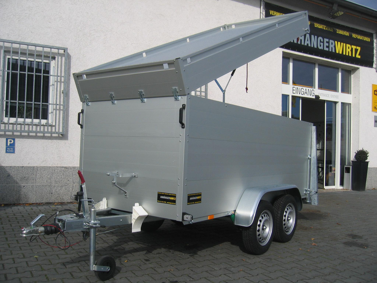 ALUBOXX Deckelanhänger GTT 1500 VT2 301x126x118cm Heckrampe (M) 1500kg order Aktion - Prikolica sa zatvorenim sandukom: slika 1 ALUBOXX Deckelanhänger GTT 1500 VT2 301x126x118cm Heckrampe (M) 1500kg order Aktion - Prikolica sa zatvorenim sandukom: slika 1