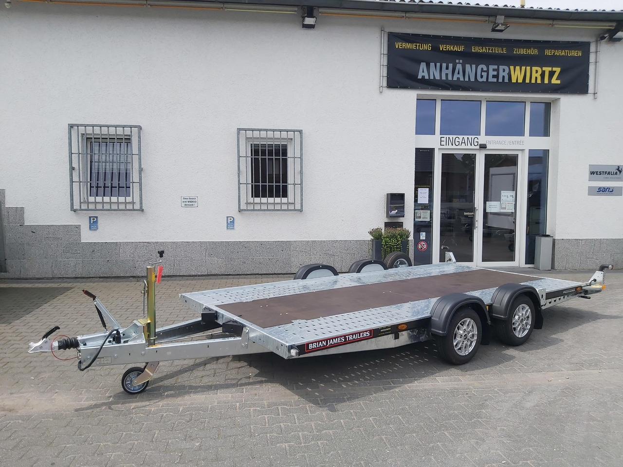 Brian James A4 Transporter 450x200cm black X Rampen 240cm Stützen Alufelgen silver 2600kg - Prikolica za prevoz automobila: slika 1 Brian James A4 Transporter 450x200cm black X Rampen 240cm Stützen Alufelgen silver 2600kg - Prikolica za prevoz automobila: slika 1
