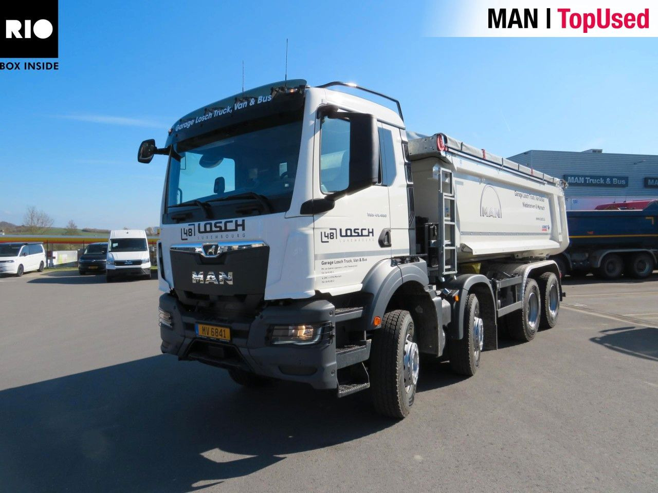 MAN TGS 41.480 8x4 BB CH Schmitz Muldenkipper - Kamion za utovaranje kontejnera: slika 1 MAN TGS 41.480 8x4 BB CH Schmitz Muldenkipper - Kamion za utovaranje kontejnera: slika 1