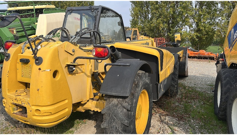 Komatsu WH 713 - Teleskopski upravljač: slika 5 Komatsu WH 713 - Teleskopski upravljač: slika 5