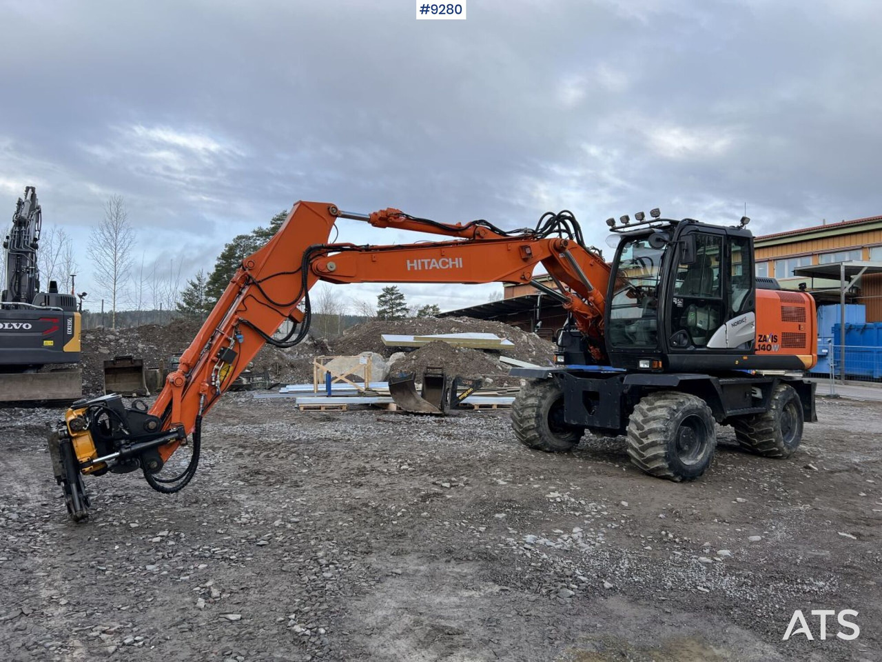 Hitachi ZX 140 W-5B wheeled excavator with gears (VIDEO) - Bager točkaš: slika 1 Hitachi ZX 140 W-5B wheeled excavator with gears (VIDEO) - Bager točkaš: slika 1