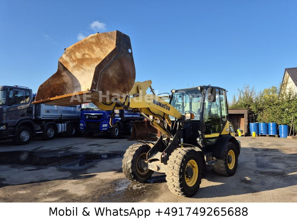 Komatsu WA70-7 *Schaufel-1,5m³/Gabel/Schnellwechsler Komatsu WA70-7 *Schaufel-1,5m³/Gabel/Schnellwechsler - Utovarivač točkaš: slika 1 Komatsu WA70-7 *Schaufel-1,5m³/Gabel/Schnellwechsler Komatsu WA70-7 *Schaufel-1,5m³/Gabel/Schnellwechsler - Utovarivač točkaš: slika 1