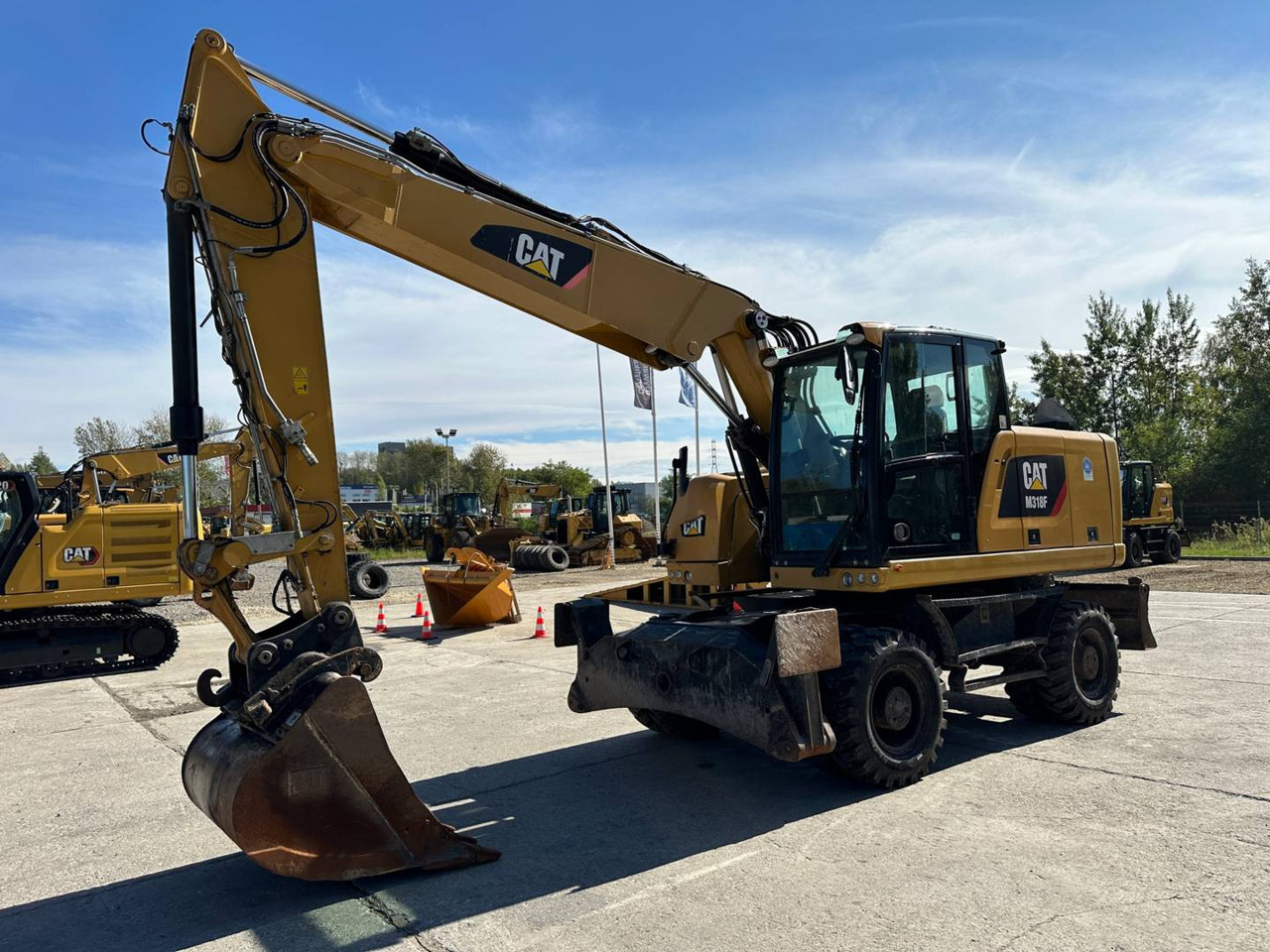 CAT M318F - Utovarivač točkaš: slika 1 CAT M318F - Utovarivač točkaš: slika 1