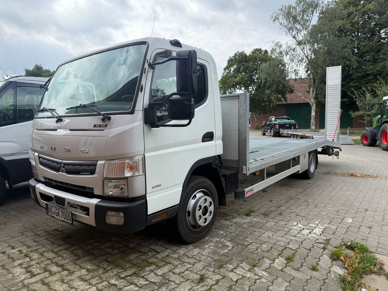 Mitsubishi Fuso Canter 7C18 Arbeitsbühnentransporter - Dostavno vozilo sa otvorenom sandukom: slika 1 Mitsubishi Fuso Canter 7C18 Arbeitsbühnentransporter - Dostavno vozilo sa otvorenom sandukom: slika 1