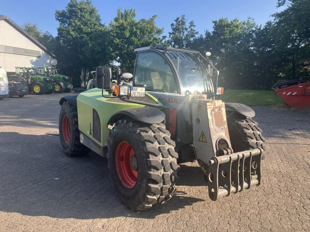 CLAAS SCORPION 7040 - Utovarivač: slika 1 CLAAS SCORPION 7040 - Utovarivač: slika 1
