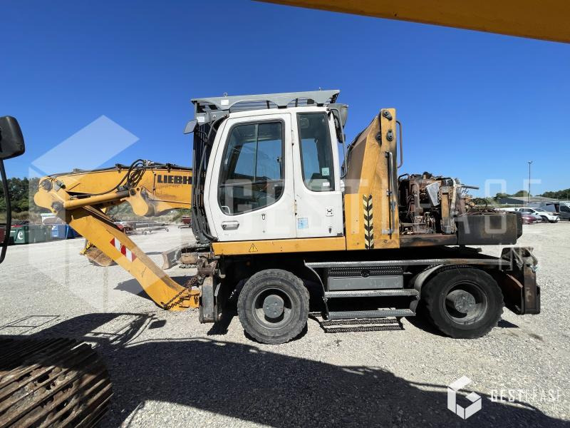 Liebherr A316 - Bager točkaš: slika 1 Liebherr A316 - Bager točkaš: slika 1