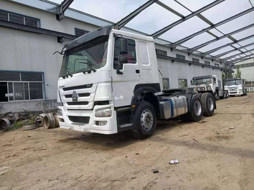 Sinotruk HOWO 6*4 Tractor - Kamion za prevoz kontejnera/ Kamion sa promenjivim sandukom: slika 1 Sinotruk HOWO 6*4 Tractor - Kamion za prevoz kontejnera/ Kamion sa promenjivim sandukom: slika 1