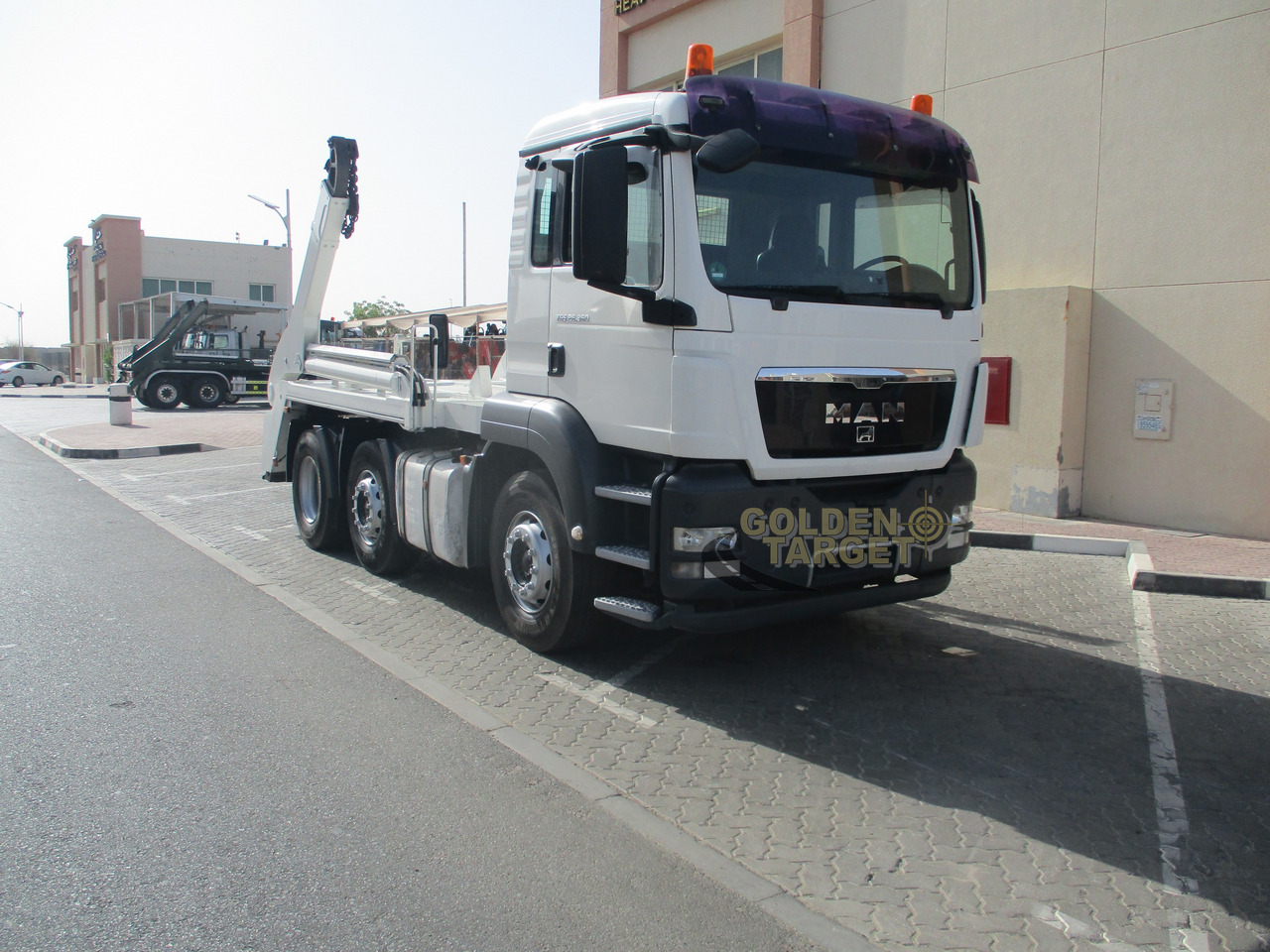 MAN TGS 26.360 6x2 Skip Loader - Kamion za utovaranje kontejnera: slika 1 MAN TGS 26.360 6x2 Skip Loader - Kamion za utovaranje kontejnera: slika 1