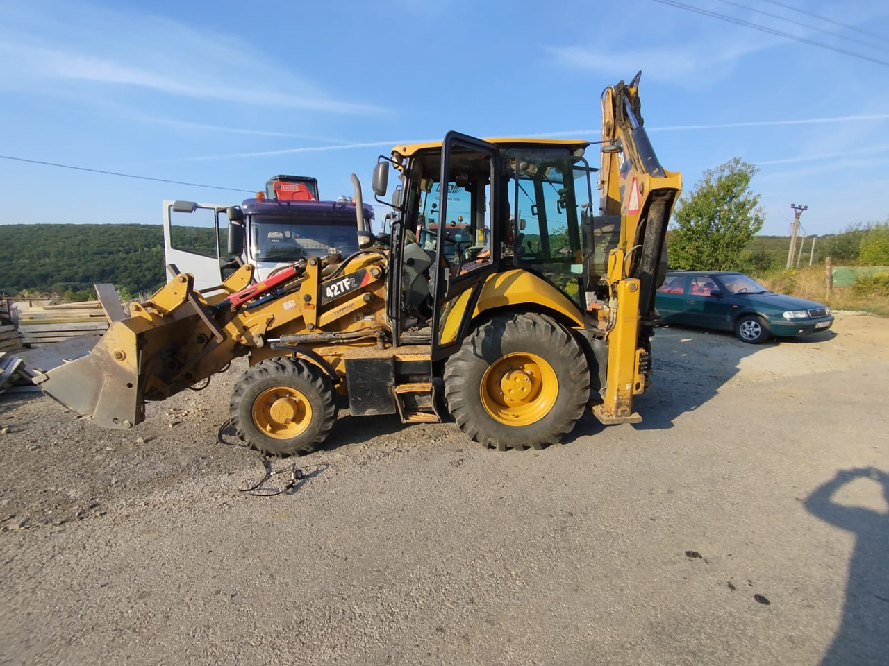 CATERPILLAR 472F2 - Bager utovarivač: slika 1 CATERPILLAR 472F2 - Bager utovarivač: slika 1
