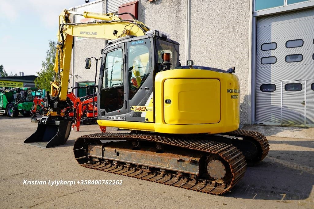New Holland E140CSR PYÖRITTÄJÄLLÄ - Bager guseničar: slika 4 New Holland E140CSR PYÖRITTÄJÄLLÄ - Bager guseničar: slika 4