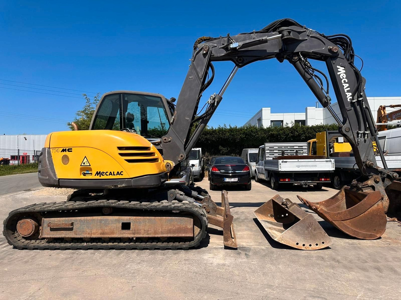 MECALAC M714. 3 Löffel + Gabel. Orginal 4098h. - Bager guseničar: slika 1 MECALAC M714. 3 Löffel + Gabel. Orginal 4098h. - Bager guseničar: slika 1