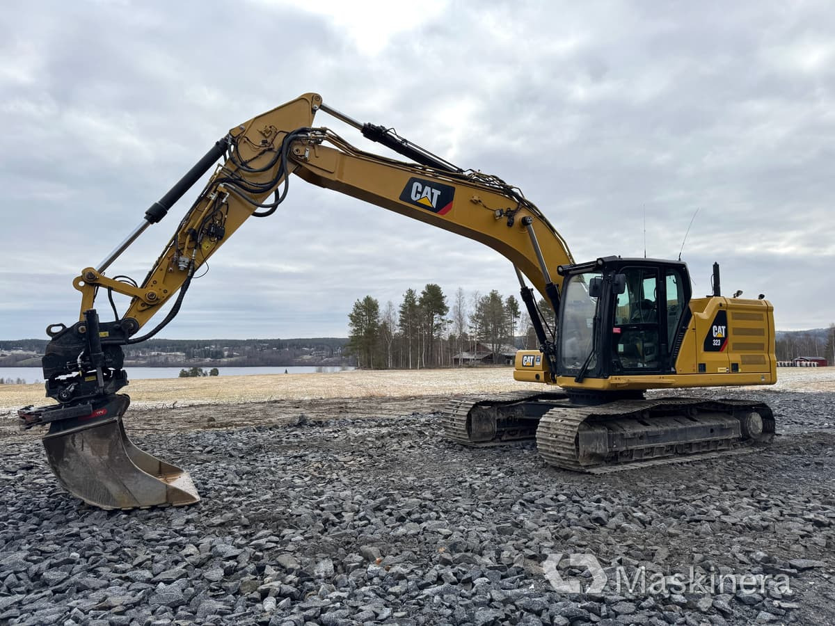 Bager guseničar Grävmaskin Cat 323 Next Generation med tillbehör: slika 1