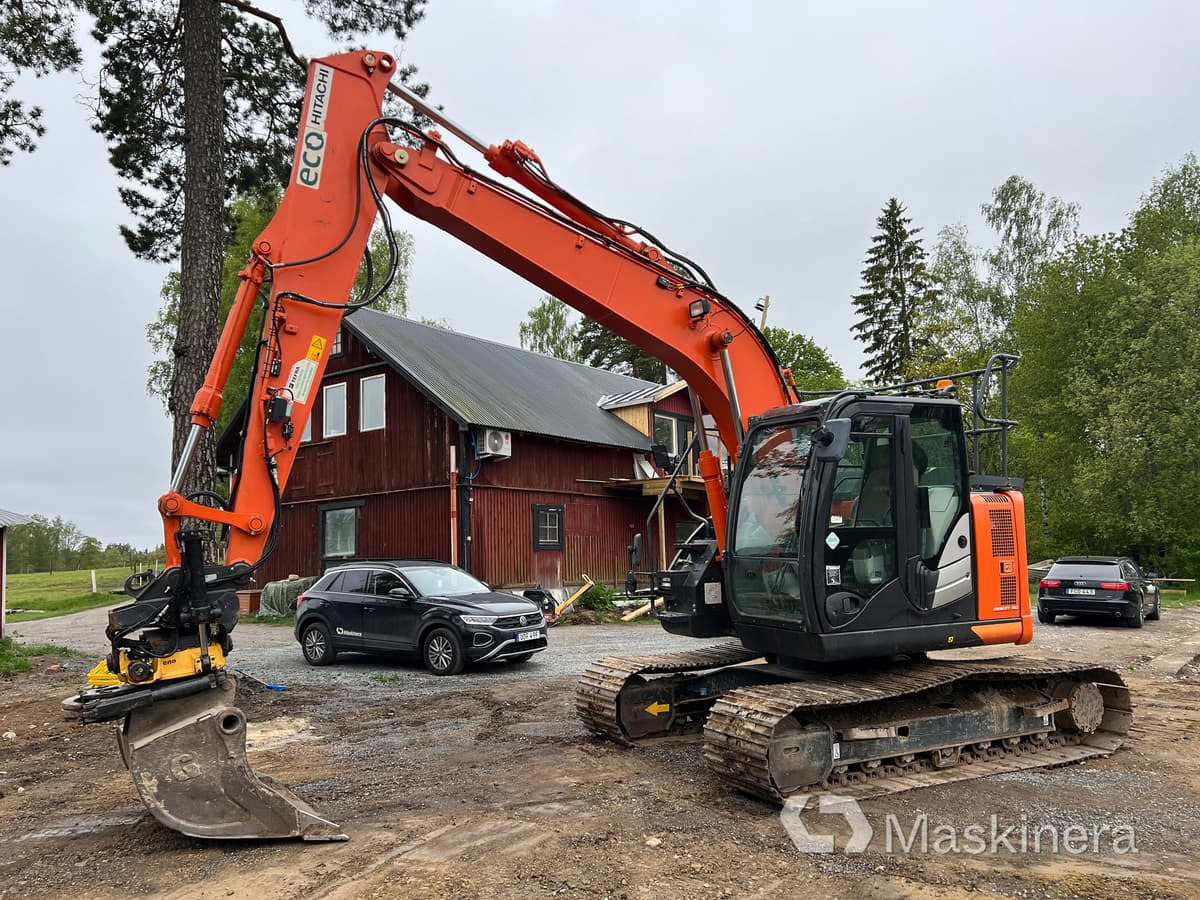 Grävmaskin Hitachi ZX135US-6 med tillbehör - Bager guseničar: slika 1 Grävmaskin Hitachi ZX135US-6 med tillbehör - Bager guseničar: slika 1