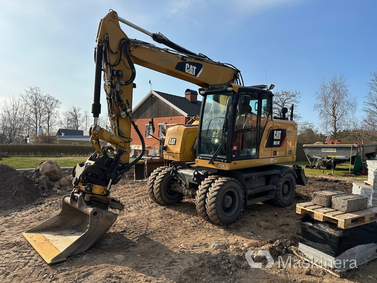 Hjulgrävare Cat M314F + redskap/vagn/grävsystem - Bager guseničar: slika 1 Hjulgrävare Cat M314F + redskap/vagn/grävsystem - Bager guseničar: slika 1