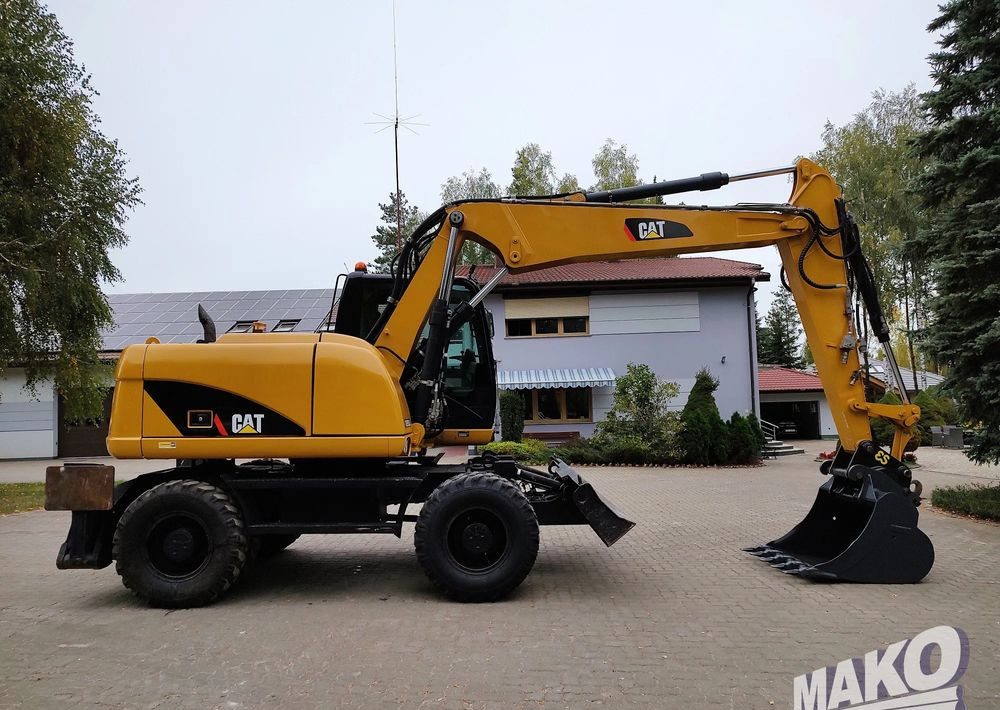 Caterpillar M313D - Bager točkaš: slika 5 Caterpillar M313D - Bager točkaš: slika 5