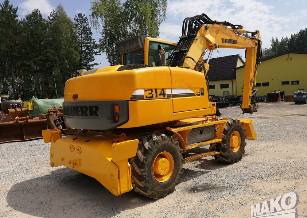 Liebherr A 314 Litronic - Bager točkaš: slika 5 Liebherr A 314 Litronic - Bager točkaš: slika 5