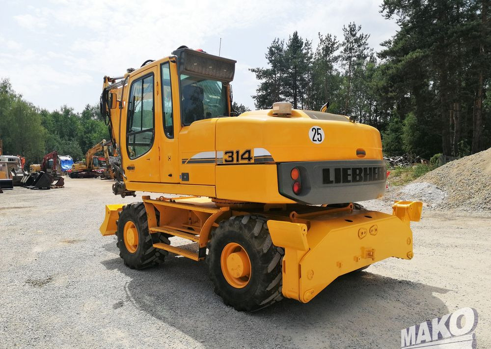 Liebherr A 314 Litronic - Bager točkaš: slika 3 Liebherr A 314 Litronic - Bager točkaš: slika 3