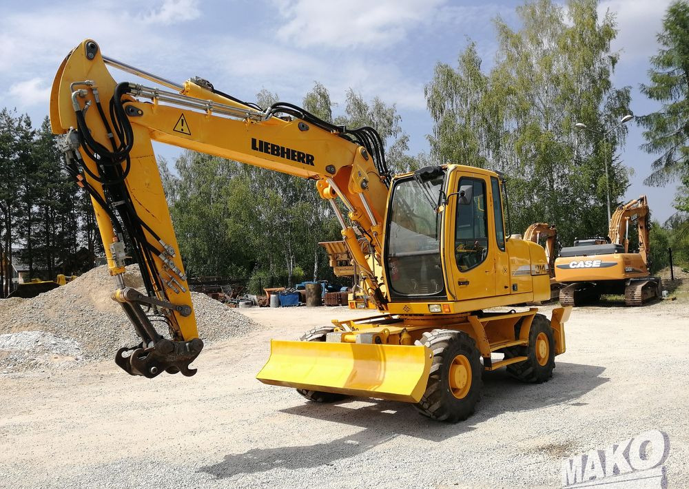 Liebherr A 314 Litronic - Bager točkaš: slika 1 Liebherr A 314 Litronic - Bager točkaš: slika 1