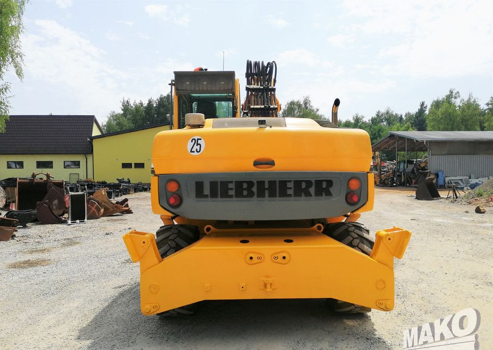 Liebherr A 314 Litronic - Bager točkaš: slika 4 Liebherr A 314 Litronic - Bager točkaš: slika 4