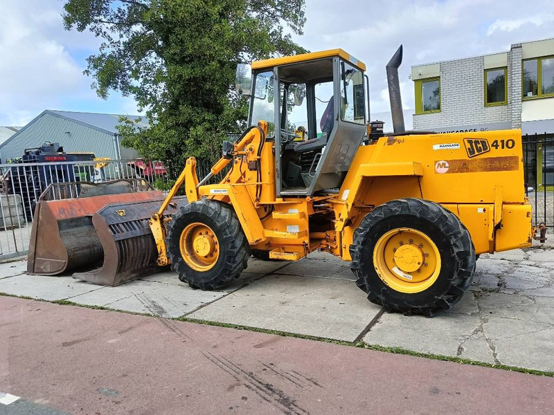 JCB 410 shovel wiellader loader + 2 bakken 4x4 robuust - Utovarivač točkaš: slika 1 JCB 410 shovel wiellader loader + 2 bakken 4x4 robuust - Utovarivač točkaš: slika 1