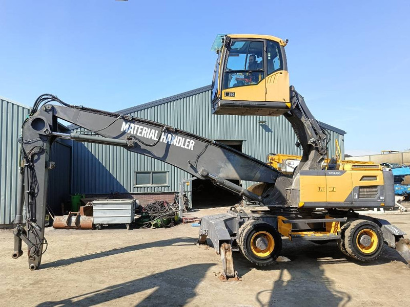 Volvo EW 210 D waste industry handler 25ton umslagbagger - Bager za obradu otpada/ Industrije: slika 1 Volvo EW 210 D waste industry handler 25ton umslagbagger - Bager za obradu otpada/ Industrije: slika 1